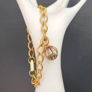 Textured gold bracelet w/birdcage dangle & stone